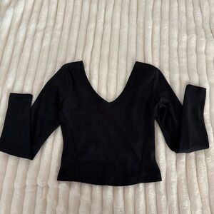 Size small Gilly Hicks athletic tee. Never worn.